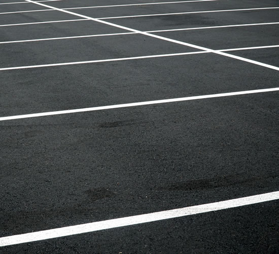 New asphalt car park complete with painted lines